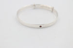 Sterling Silver Childs Patterned Expander with garnet